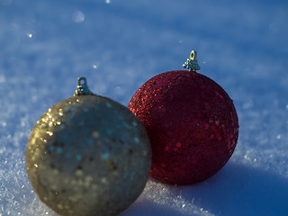 Image showing christmas balls decoration in snow