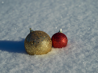 Image showing christmas balls decoration in snow