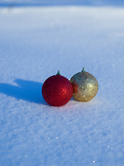 Image showing christmas balls decoration in snow