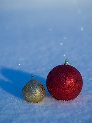 Image showing christmas balls decoration in snow