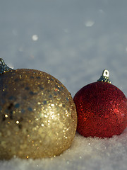 Image showing christmas balls decoration in snow