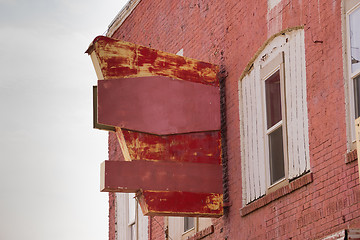 Image showing Abandoned Commericial Building Space Worn Out Painted Sign