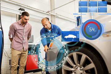 Image showing auto mechanic with clipboard and man at car shop