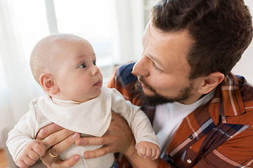 Image showing close up of father with little baby boy at home