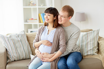 Image showing happy pregnant wife with husband at home