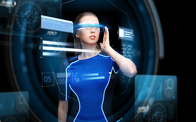 Image showing woman in virtual reality 3d glasses with charts