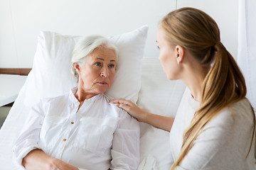 Image showing daughter visiting her senior mother at hospital