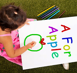 Image showing Girl Writing Apple Shows Kid Learning Alphabet