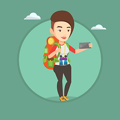 Image showing Woman with backpack making selfie.