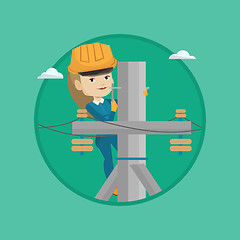 Image showing Electrician working on electric power pole.