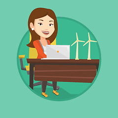 Image showing Woman working with model of wind turbines.