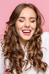 Image showing The young woman\'s portrait with happy emotions