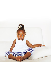 Image showing little cute african american girl playing with animal toys at ho