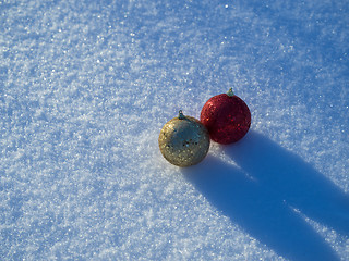 Image showing christmas balls decoration in snow