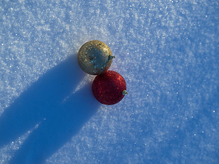 Image showing christmas balls decoration in snow