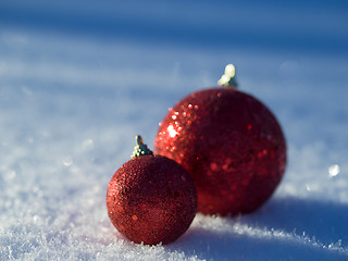 Image showing christmas balls decoration in snow