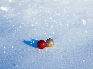 Image showing christmas balls decoration in snow