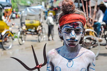 Image showing Boy with pitchfork in Assam