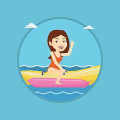 Image showing Tourists riding a banana boat vector illustration.