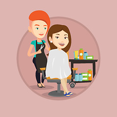 Image showing Hairdresser making haircut to young woman.