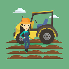 Image showing Farmer standing with tractor on background.