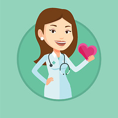 Image showing Doctor cardiologist holding heart.