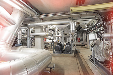 Image showing Equipment, cables and piping as found inside of a modern industr