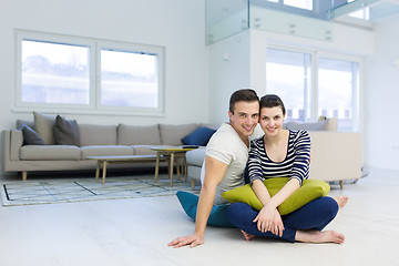 Image showing couple sitting on the floor at home