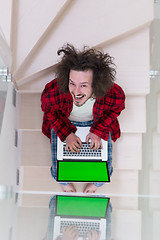 Image showing freelancer in bathrobe working from home