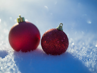 Image showing christmas balls decoration in snow