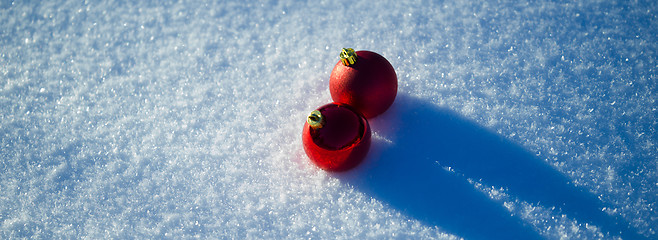 Image showing christmas balls decoration in snow