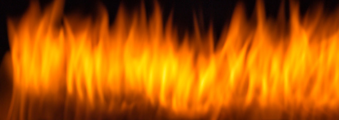 Image showing blurred flame on black 