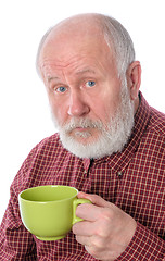 Image showing Senior man with green cup, isolated on white