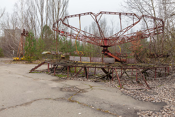 Image showing Attraction in amusement park in overgrown ghost city Pripyat.