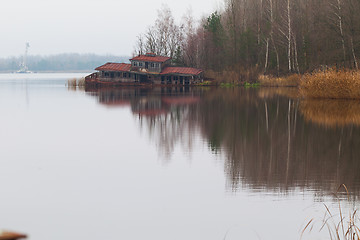 Image showing Sinking boat station building on a Yanov backwater in Pripyat city, Chernobyl Exclusion Zone, Ukraine