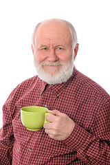 Image showing Happy senior man with green cup, isolated on white