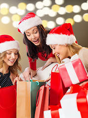 Image showing women with shopping bags and christmas gifts