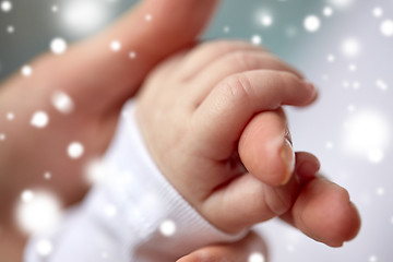 Image showing close up of mother and newborn baby hands