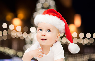 Image showing little baby boy in santa hat at christmas