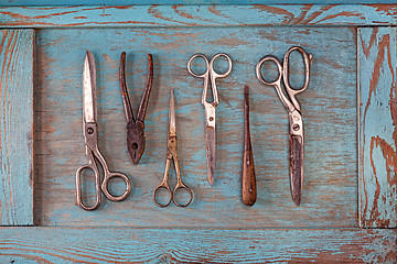 Image showing Collection of vintage tools on a blue wooden background