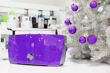 Image showing Ultraviolet home appliances store at Christmas