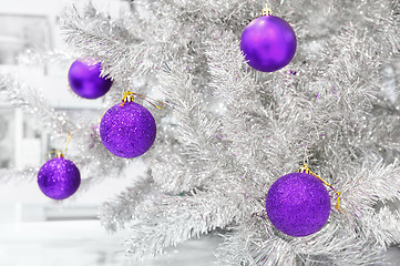 Image showing baubles ultraviolet on silver artificial Christmas tree