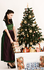 Image showing Bavarian Girl with Christmas present