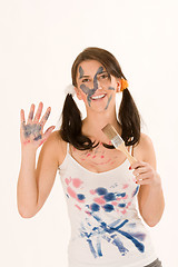 Image showing Young woman with paint on his face