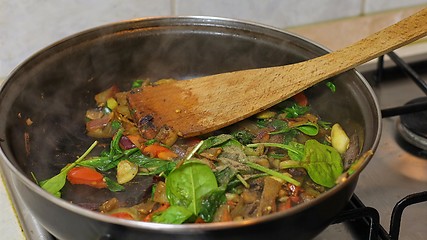 Image showing Preparing hot breakfast