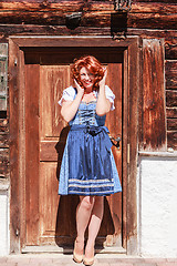 Image showing Laughing Bavarian Beauty in Dirndl