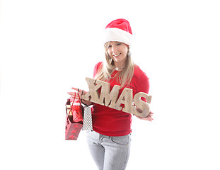 Image showing Festive woman holding a Xmas sign