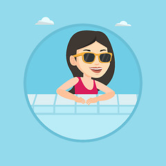 Image showing Smiling young woman in swimming pool.