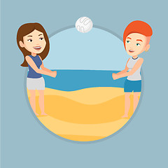 Image showing Two women playing beach volleyball.