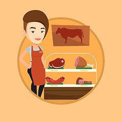 Image showing Butcher offering fresh meat in butchershop.